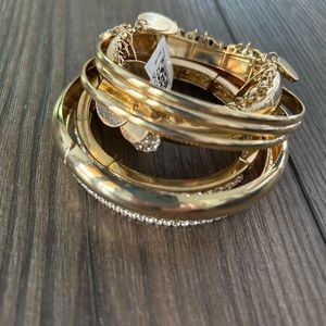Women’s 7 piece gold bracelet set. Brand new with tags